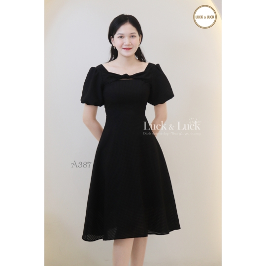Đầm xòe nhấn nơ ngực tay bí