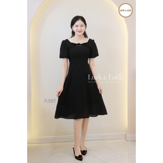 Đầm xòe nhấn nơ ngực tay bí